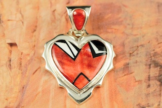 Genuine Spiny Oyster Shell, Magnesite and Black Jade inlaid in Sterling Silver.  Precision inlay on the Bale and Pendant. Free 18" Sterling Silver Chain with Purchase of Pendant. Stunning Heart Pendant Created by Navajo Artist Rick Tolino. Signed.